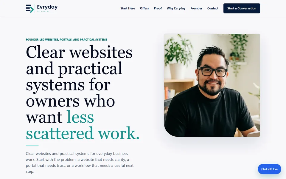 Evryday Studio homepage with a teal-highlighted Georgia headline and Robbie's founder portrait